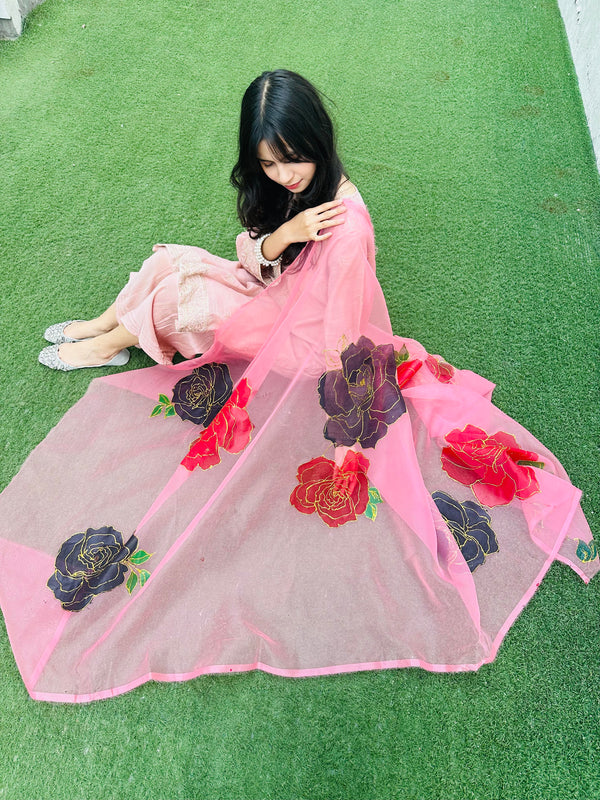 Model wearing Ghulab hand painted pink organza dupatta with floral rose artwork by Sajra by Umme