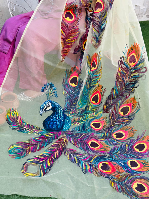 Close view of Moor hand painted organza dupatta with peacock artwork and multicolored feather detailing